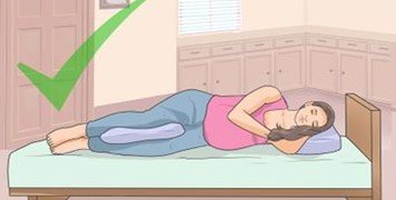 روش خوابیدن برای کاهش کمردرد بارداری